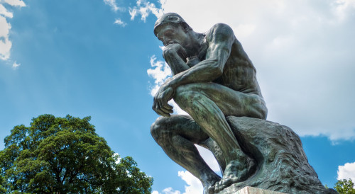 (picture of Auguste Rodin’s sculpture, The Thinker)