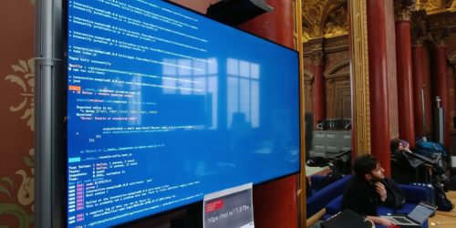 Some code displayed on a giant screen of the Paris office during the MDN Paris Event