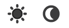 Two buttons marked with sun and moon icons